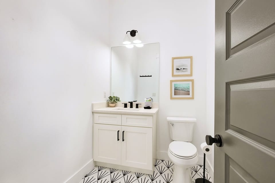1st Floor - Half bath accessible from the inside and also from the pool