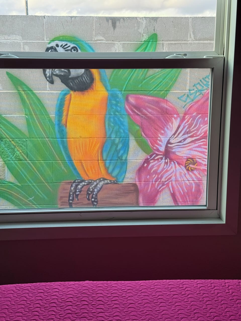 Local artist mural outside main floor bedroom