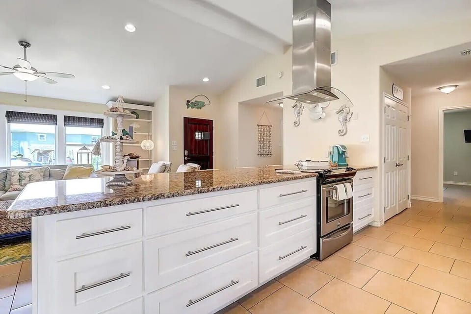 Stainless steel appliances and granite countertops. 