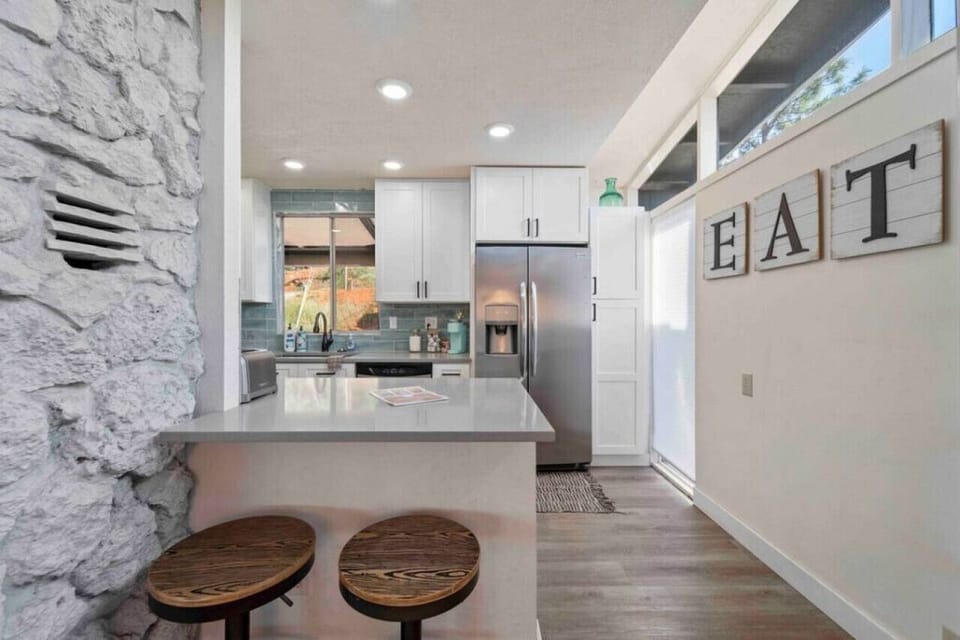 Barstool seating near at the kitchen counter