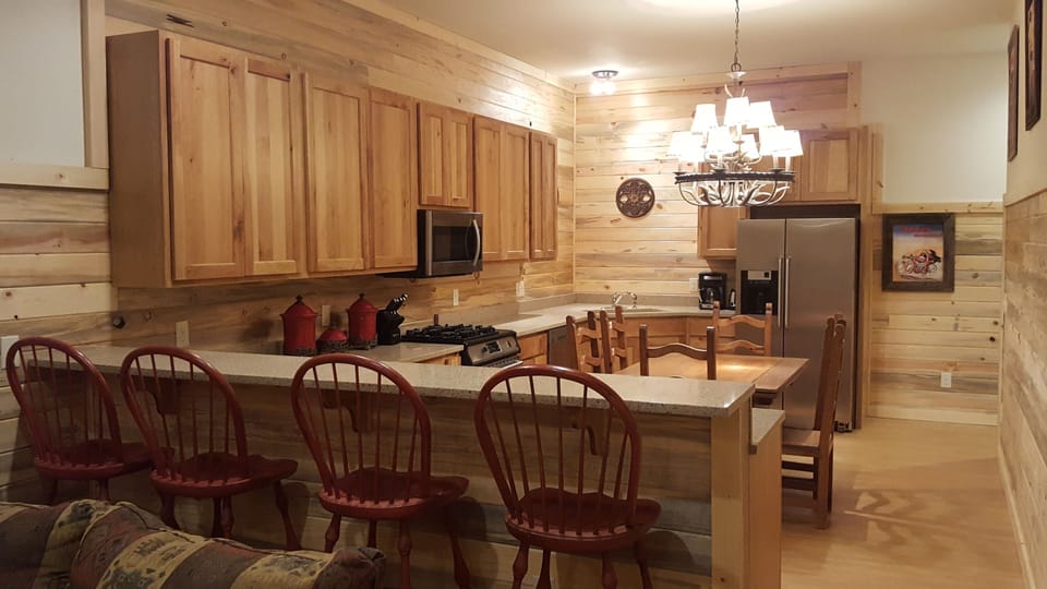 Unit D-3 Bedroom Deluxe w /washer/dryer | Private kitchen | Fridge, microwave, oven, stovetop