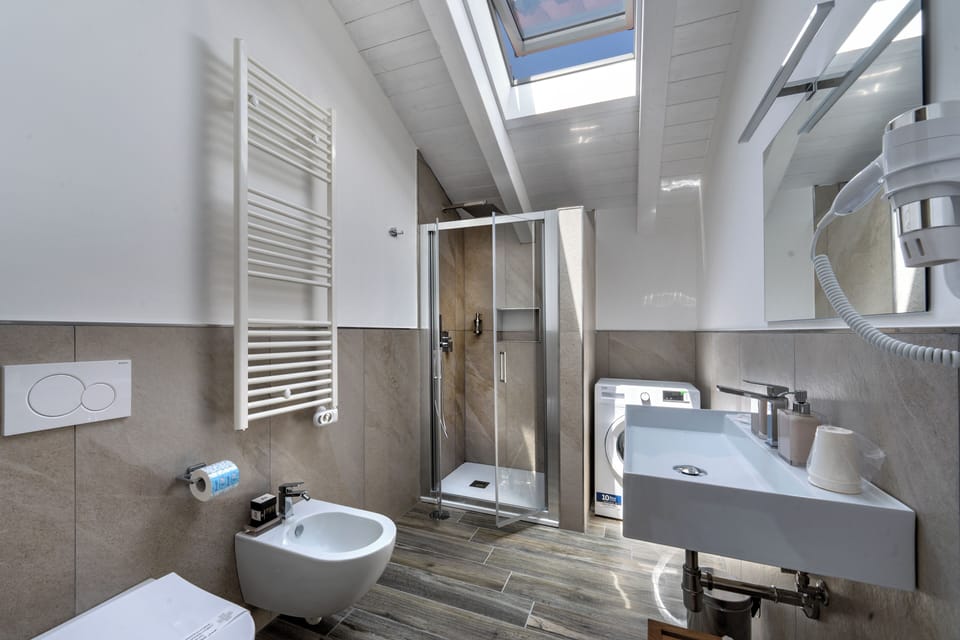 AGAVE APARTMENT | Bathroom | Shower, rainfall showerhead, slippers, bidet