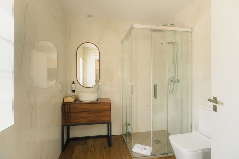 Designer toiletries, hair dryer, bidet, towels