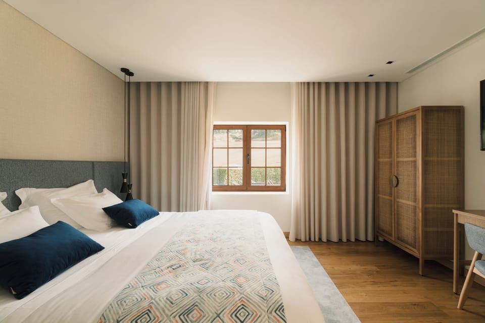 Deluxe Room | In-room safe, individually decorated, desk, iron/ironing board