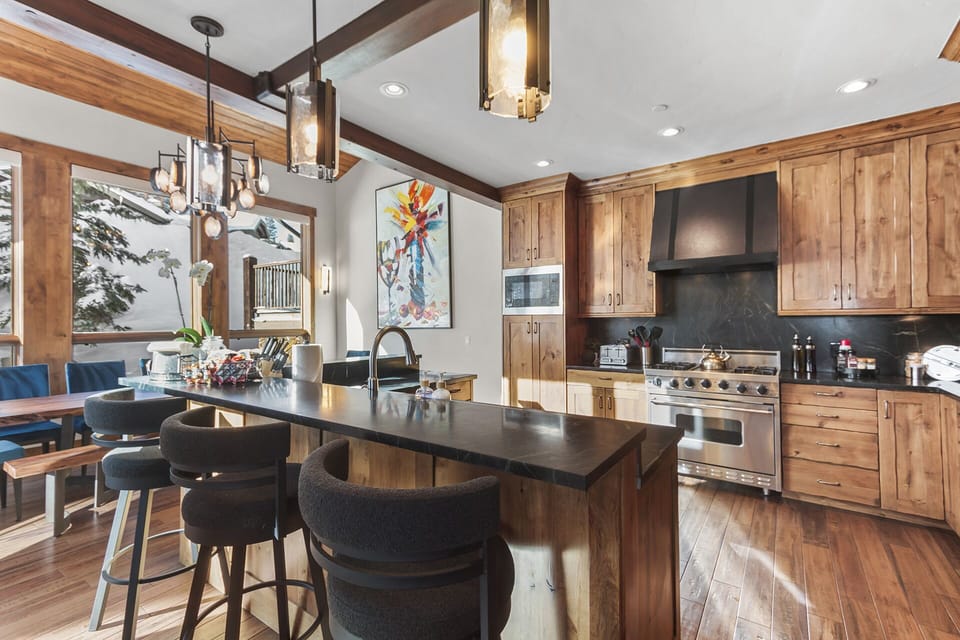 Chef-Ready Kitchen — An impeccably stocked gourmet kitchen—prep, plate, and serve with ease, whether it's apres snacks or a full dinner. 🍳✨