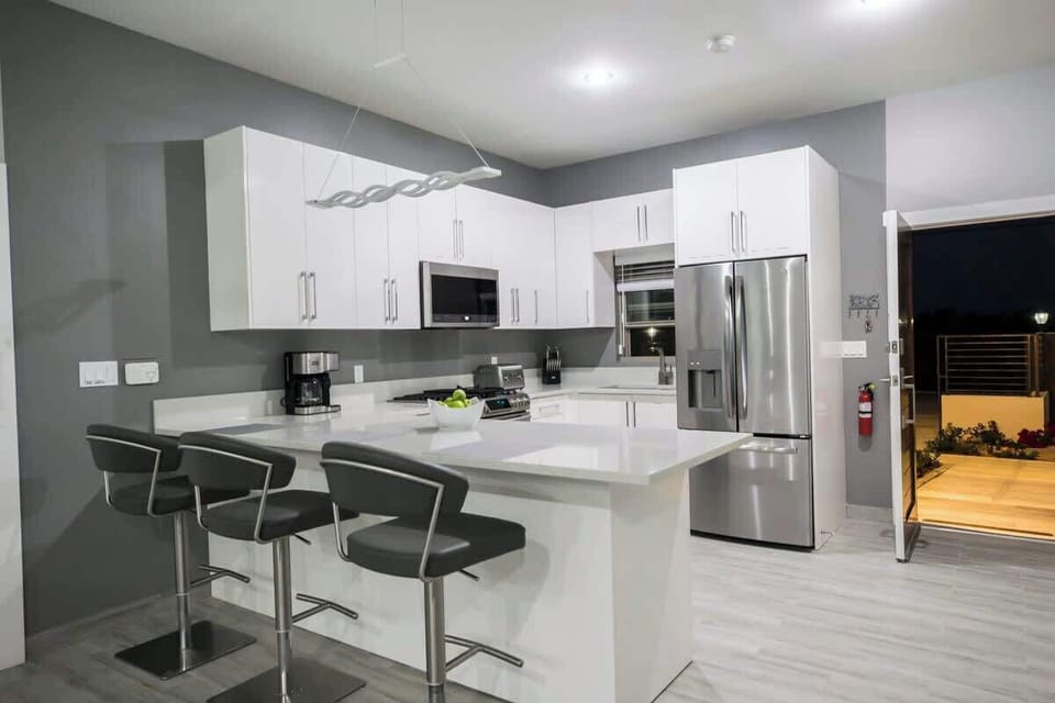 Breakfast bar, and full size fridge & freezer