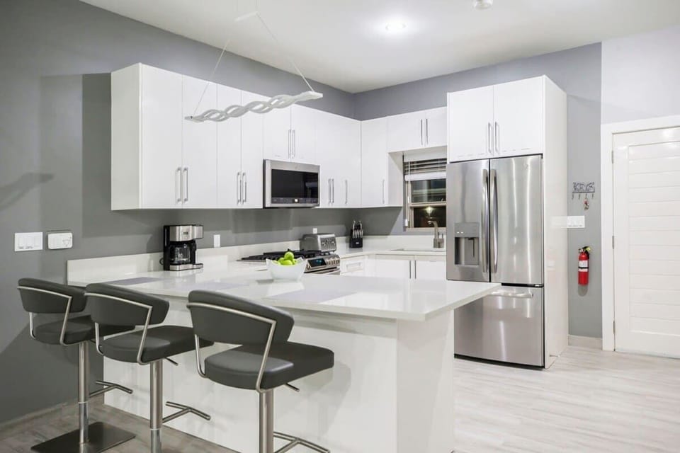 You can prepare any meal at home and enjoy it at the nearby dining table or breakfast bar.