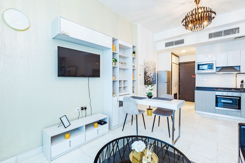 Deluxe Studio | Living area | 42-inch Smart TV with cable channels, Netflix, streaming services