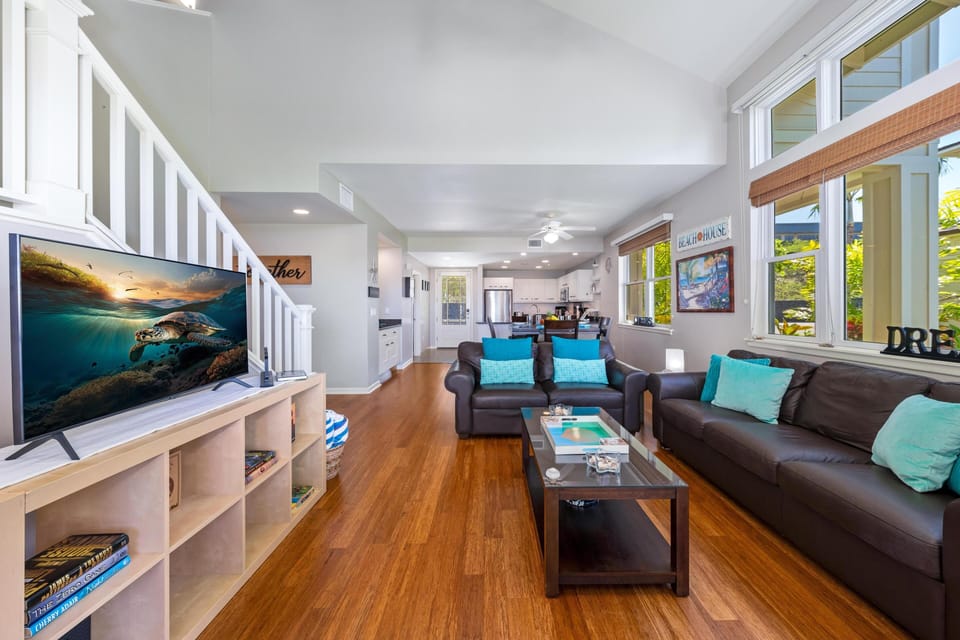 Open concept layout blends the living room, dining area, and kitchen