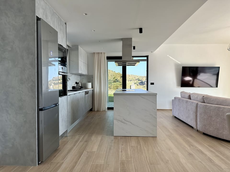 A large kitchen with easy access to terrace!