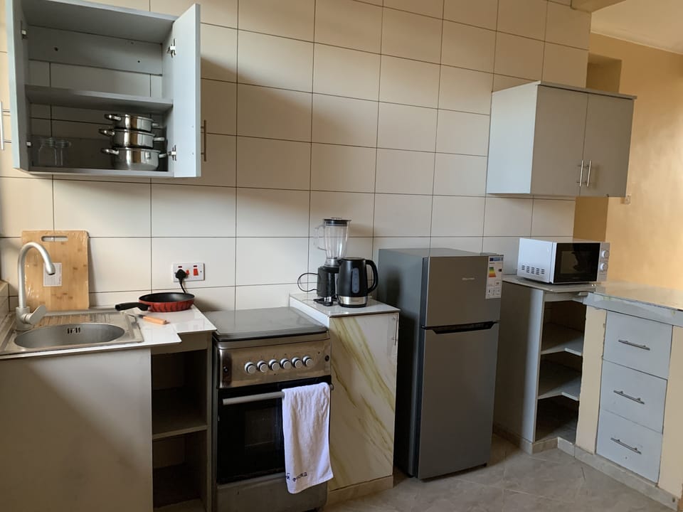 KENWOOD electric cattle ,HISENSE microwave oven and double doors and cutlery.