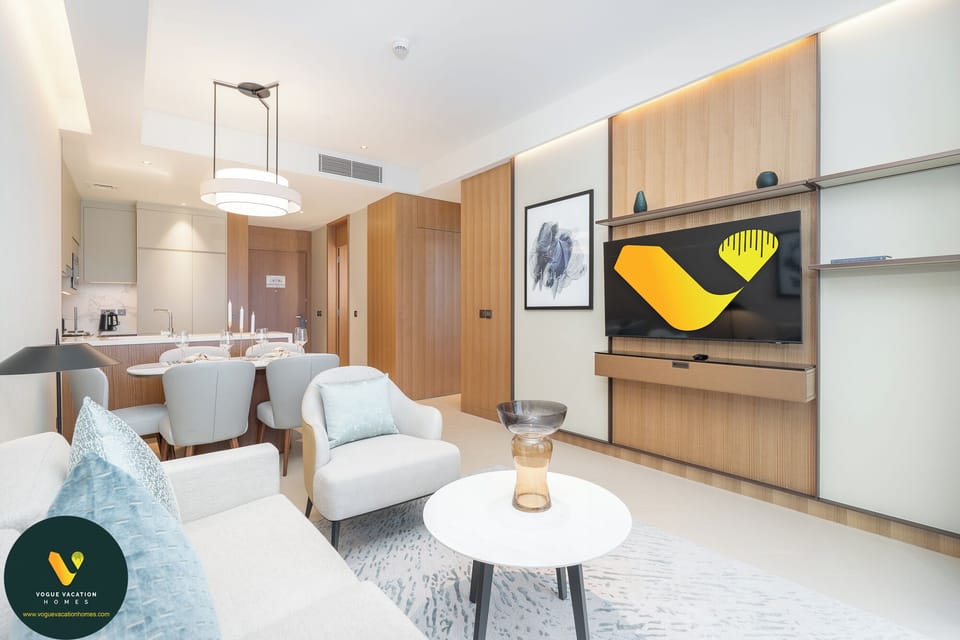 Luxury Apartment | Living area | 65-inch Smart TV with cable channels