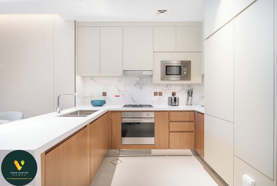 Luxury Apartment | Private kitchen | Full-size fridge, microwave, oven, stovetop