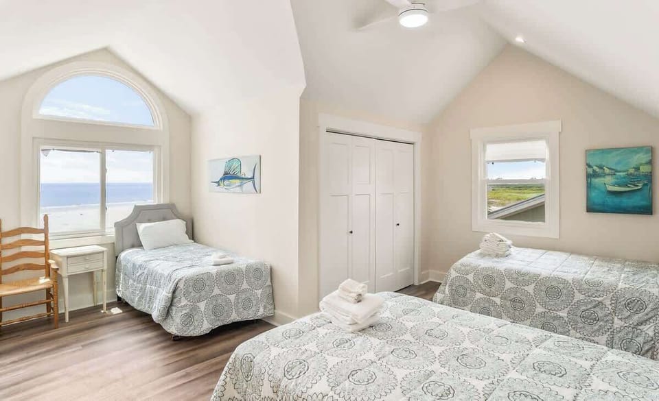Two Full Beds + One Twin, with En-Suite Bath (walk in shower)