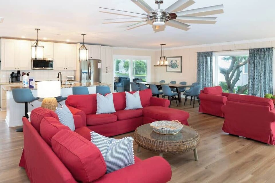 Open Concept Living Room with Access to Front Porch and Screened Porch