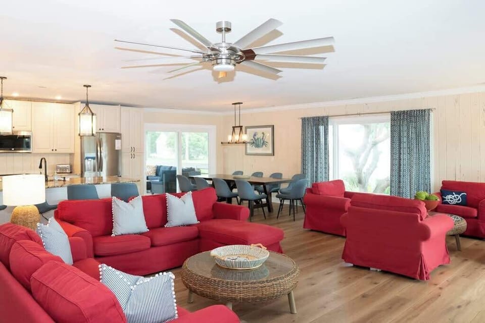 Open Concept Living Room with Access to Front Porch and Screened Porch