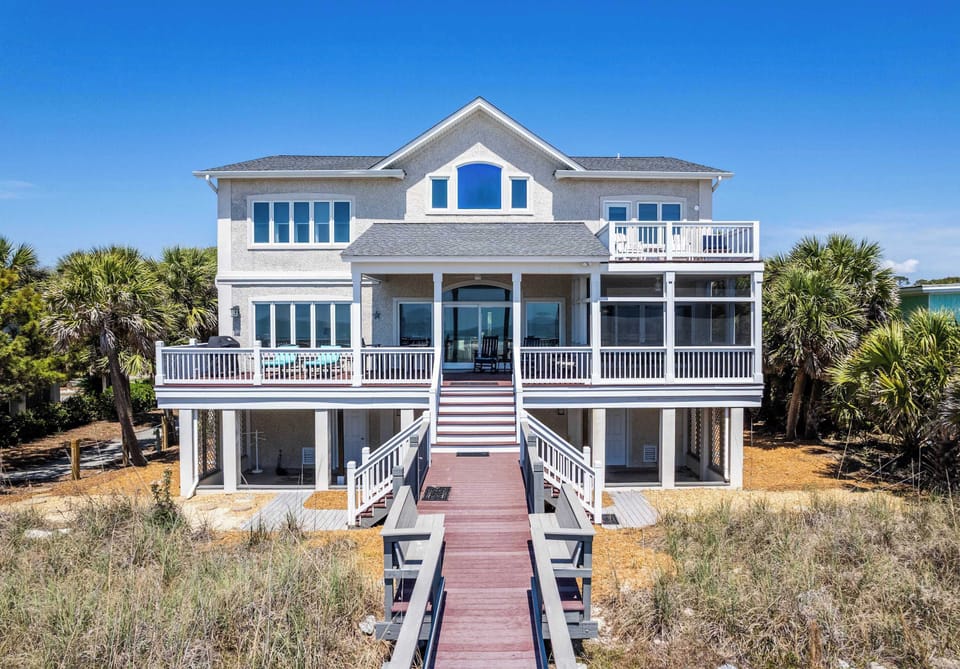 Back of the house with private beach access