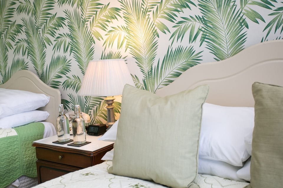 Deluxe Room, Ensuite, Sea View | Desk, blackout drapes, iron/ironing board, free WiFi