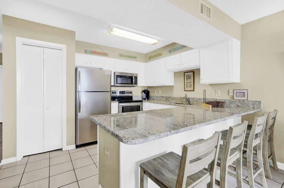 Well-Equipped Kitchen -  granite counters and stainless appliances. 