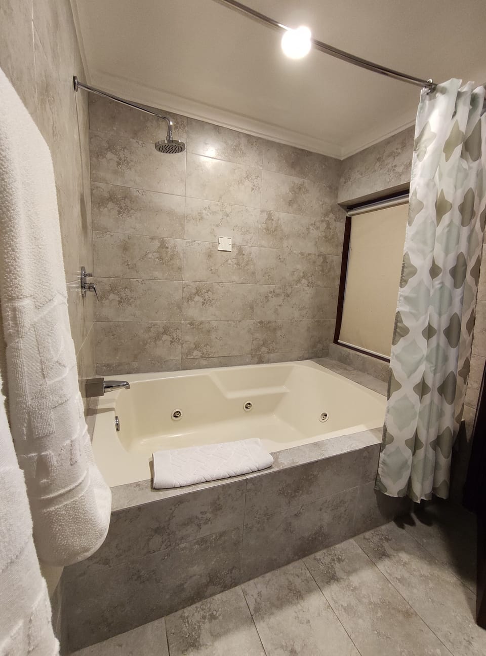 Superior Suite, 1 King Bed | Bathroom | Hair dryer (on request), towels, soap, shampoo