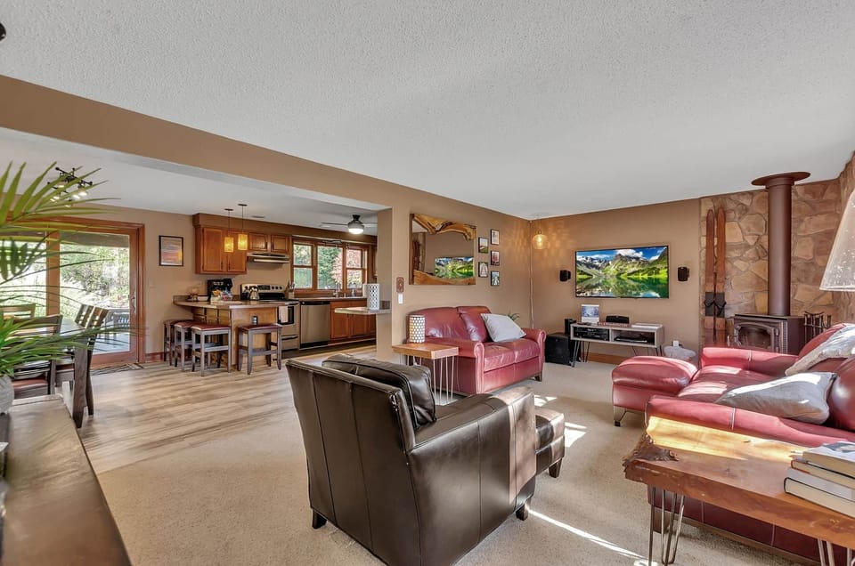 Warm open-concept living space with room to gather, unwind, and reconnect after a day around Ellicot