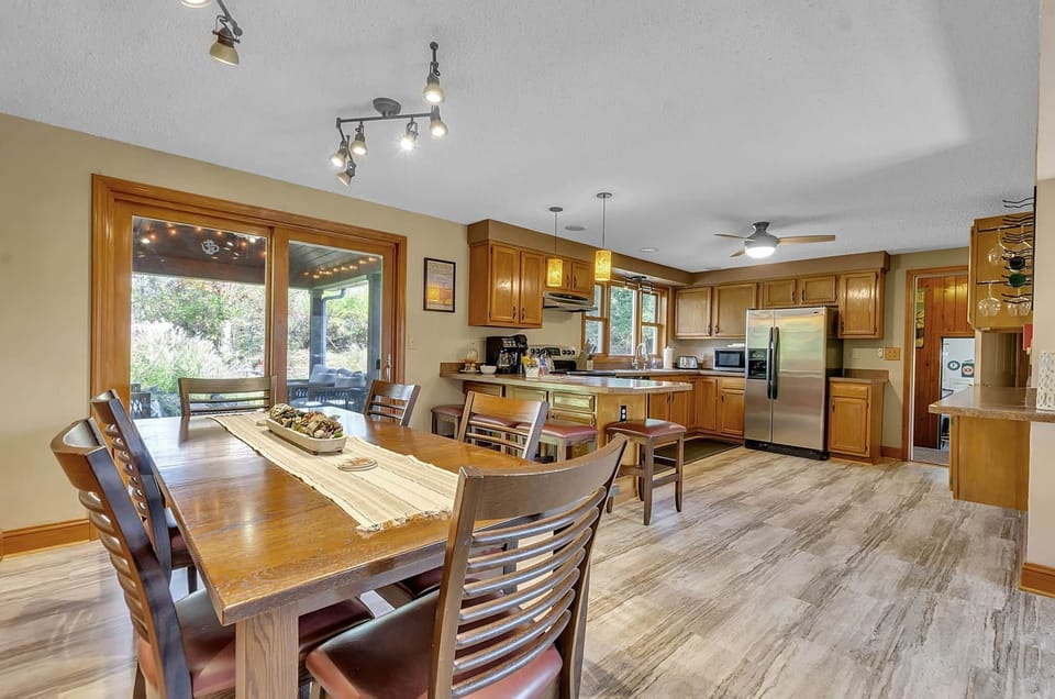 Fully connected kitchen, dining, and living spaces designed for easy group stays.