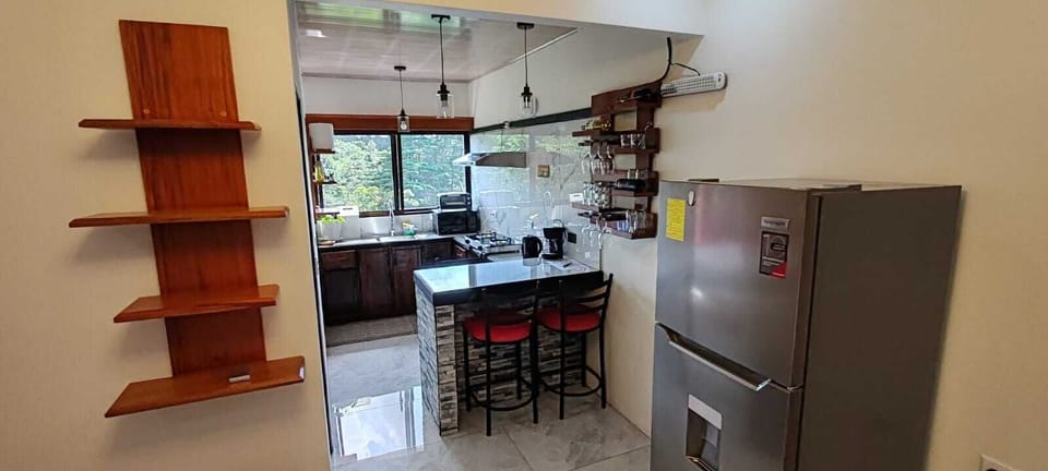 Deluxe Studio, 2 Bedrooms | Private kitchen | Mini-fridge, microwave, coffee/tea maker, toaster