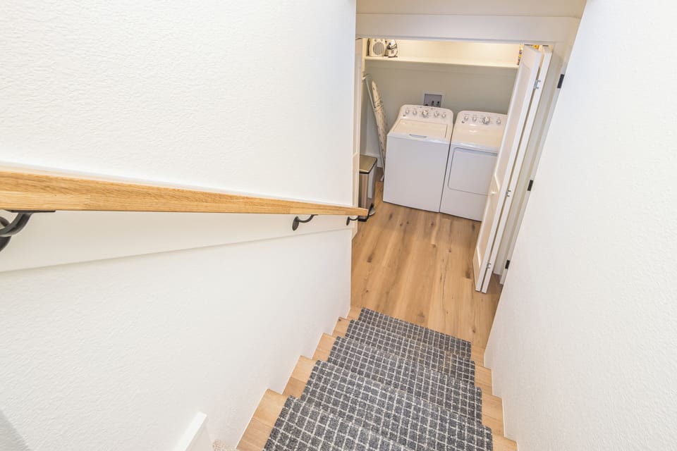 Steps to the lower-level laundry area