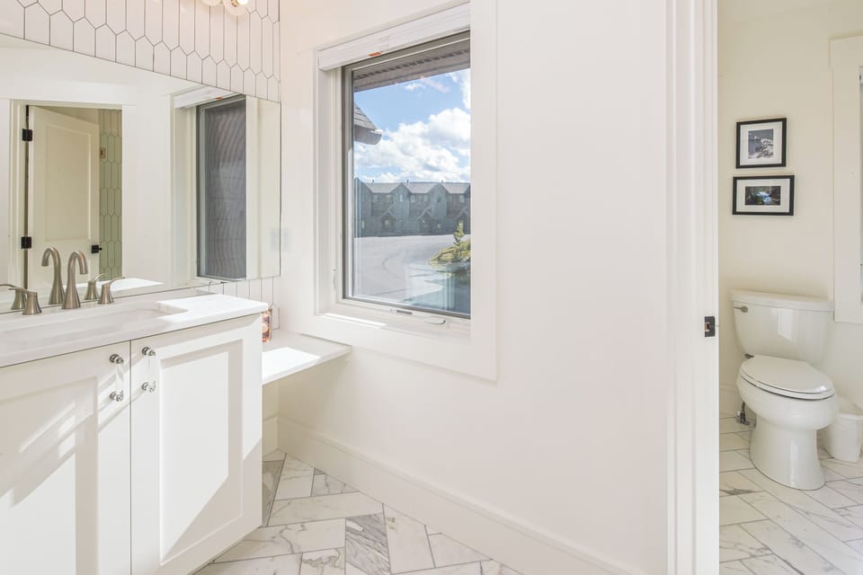 Single vanity, large open floor plan