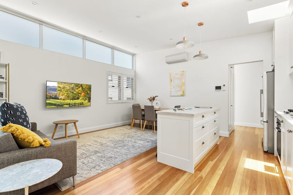 Open plan living space - please note couch now faces tv