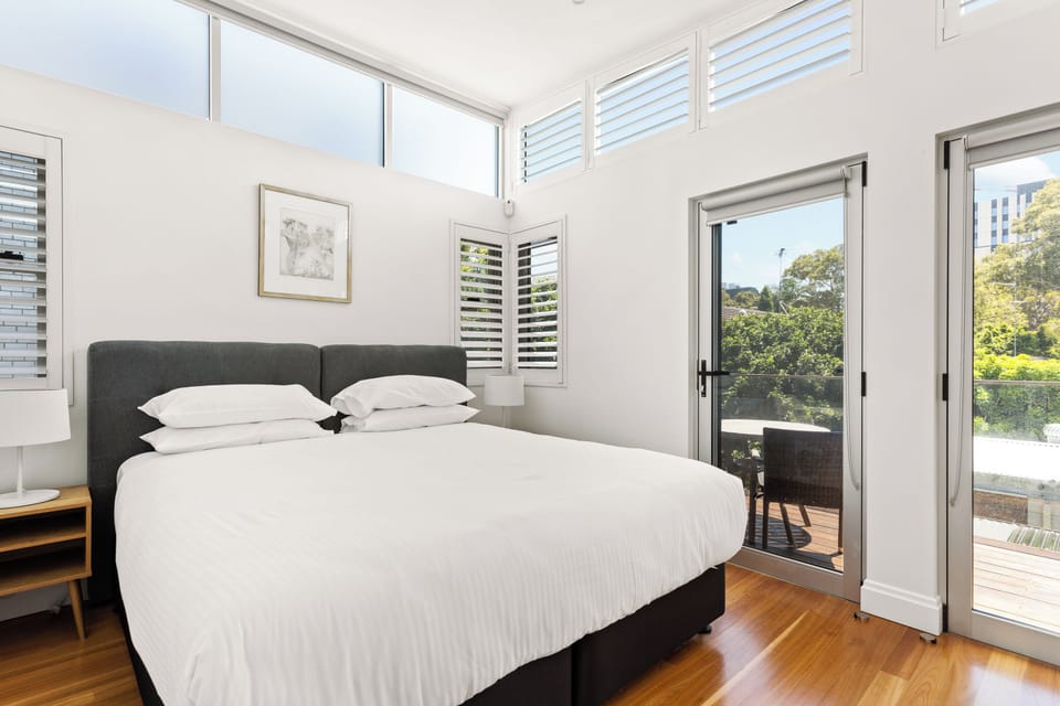 Master bedroom with king bed, aircon and private balcony