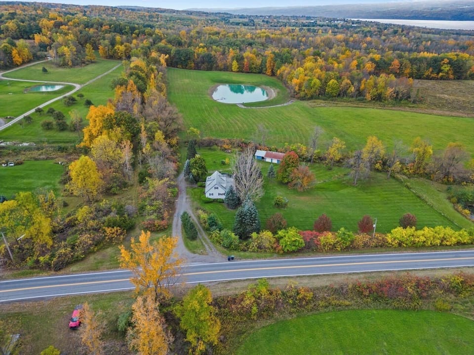 A stunning aerial shot capturing the entire property and its surroundings from above.