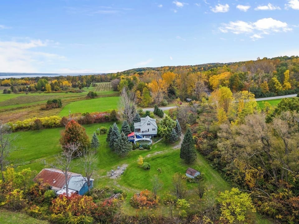 A stunning aerial shot capturing the entire property and its surroundings from above.