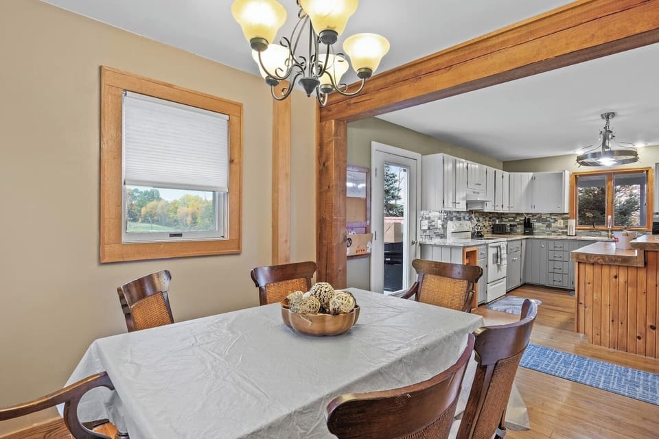 Elegant dining table comfortably seating six, perfect for gatherings and meals with loved ones.