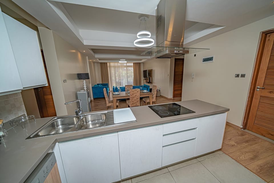 Comfort Apartment | Private kitchen | Fridge, microwave, cookware/dishes/utensils