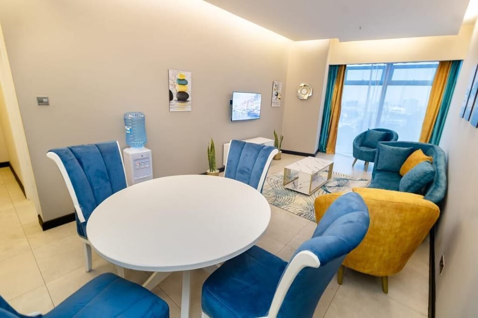 Deluxe Apartment | Living area | 24-inch Smart TV with digital channels