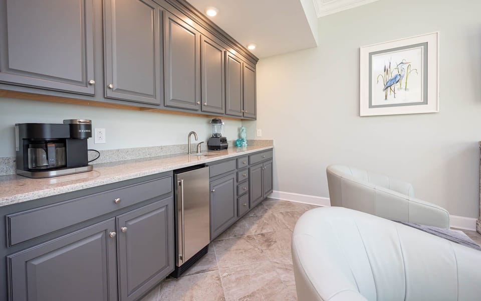 Brew coffee at the Keurig, use the bar sink and blender, or grab a chilled drink from the wet bar