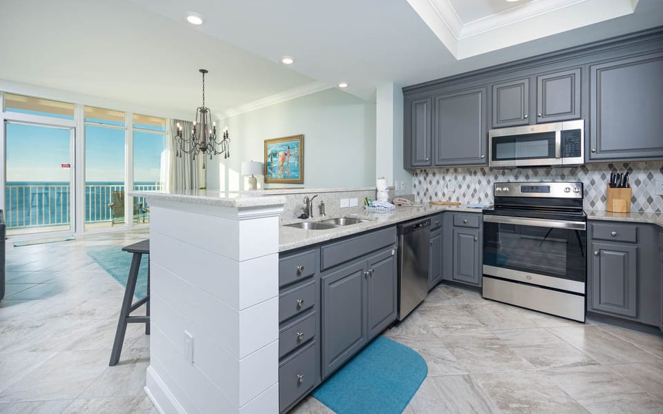 Prepare meals in this elegant kitchen with stylish cabinetry and stainless appliances