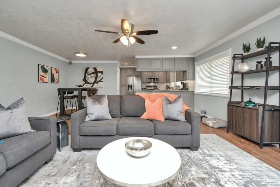 Enjoy the open floor plan of the living room that seamlessly flows into the kitchen & dining area, making it the perfect space for entertaining friends & family. Gather together in a warm, inviting atmosphere where memories, and good food, are made!