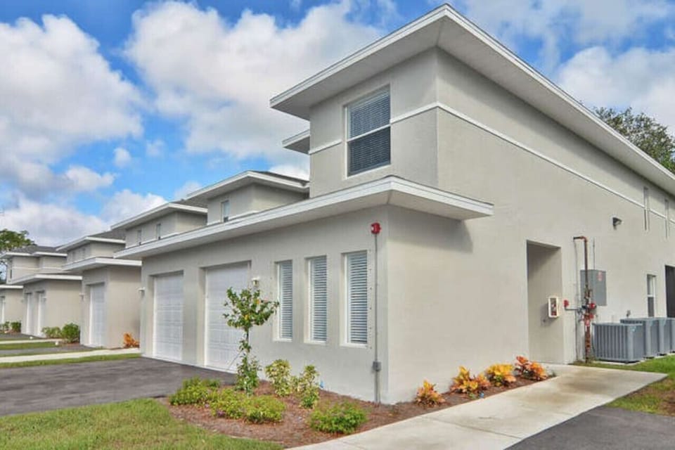 Corner townhouse in small community with community pool.