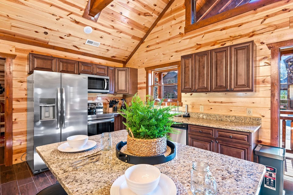Fully equipped kitchen with two dual door refrigerators.