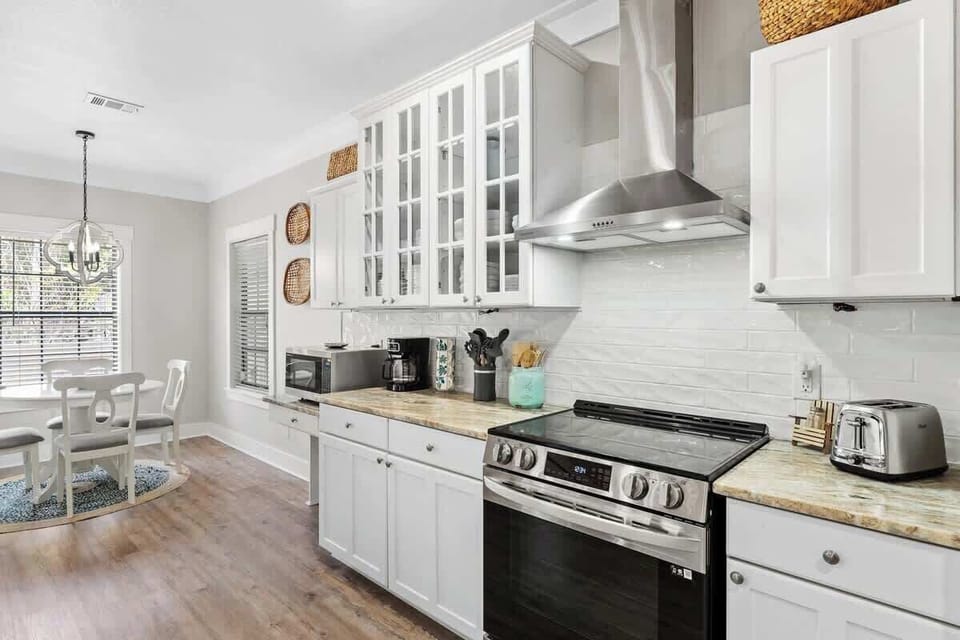 Cook, chat, and relax in our bright kitchen open to the living area.