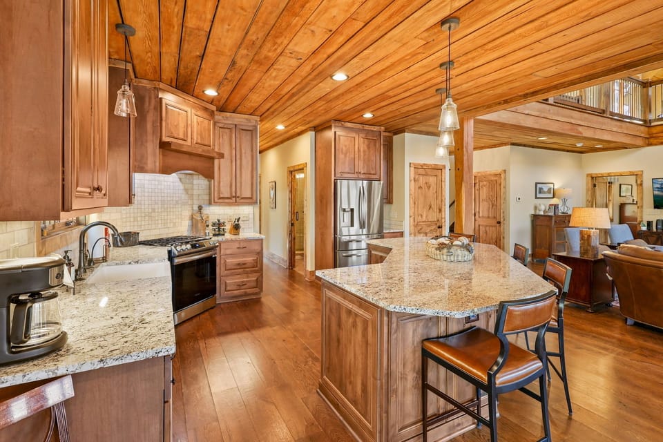 Open floor plan kitchen with spacious island - 4 island stools
