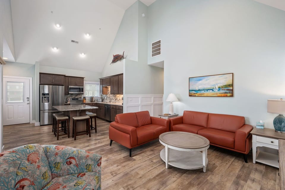 NH387A: Bodie Island Cottage | Living Room Area- Deck Access