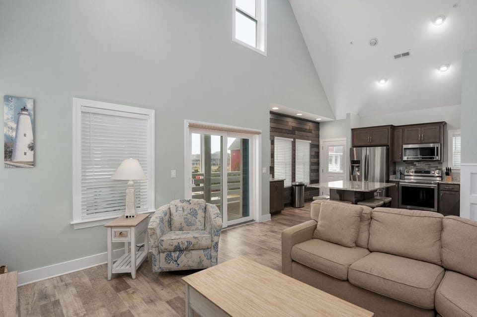 NH387B: Ocracoke Cottage | Living Room Area- Deck Access