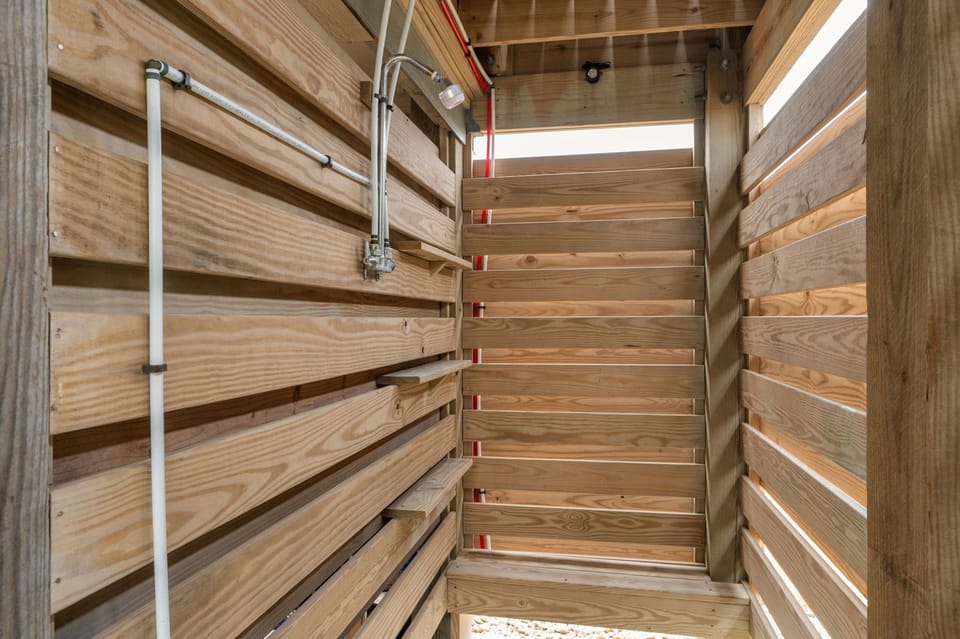 NH387D: Cape Lookout Cottage | Enclosed Outdoor Shower