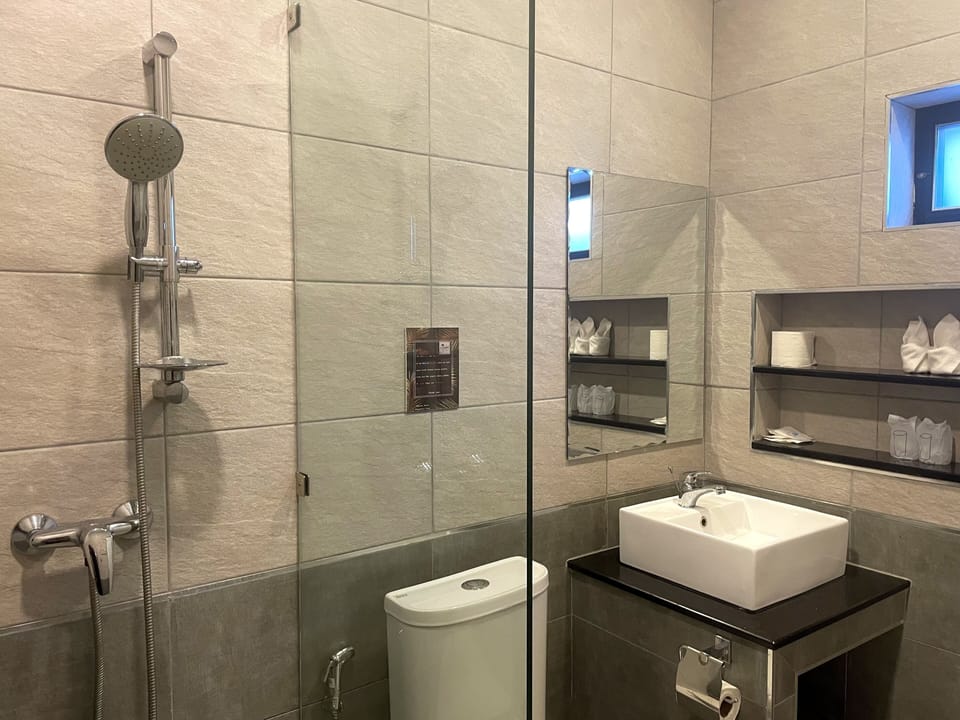 Shower, free toiletries, hair dryer, towels