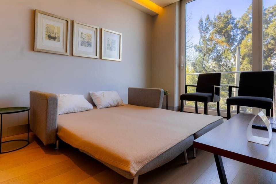 Spacious lounge with a high-quality sofa bed.