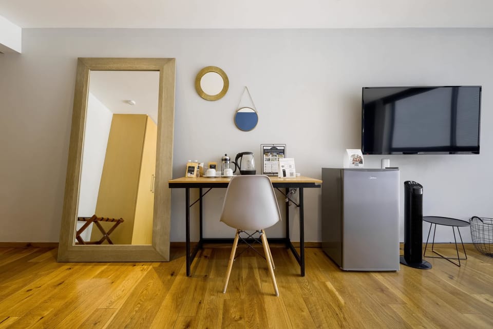 Work comfortably with a dedicated desk and chair.


