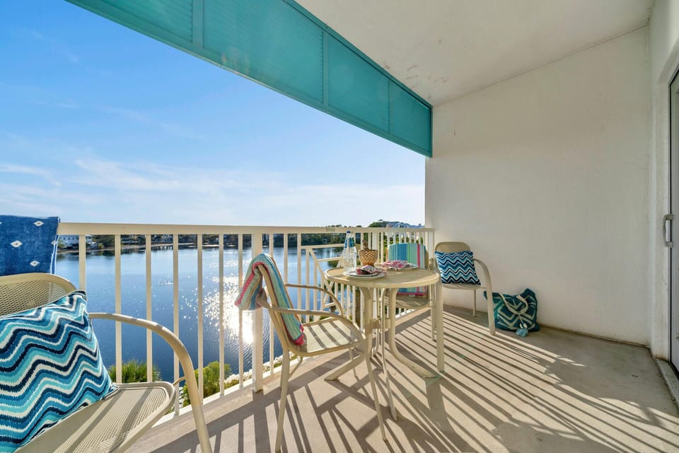 Your private waterfront balcony offers stunning lake views with comfortable seating for morning coffee or sunset drinks.